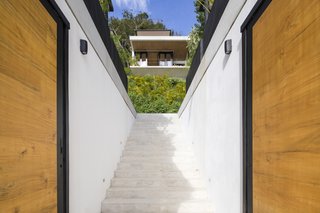 Each pavilion-like hotel room feels open to the outdoors, but also features plenty of privacy.