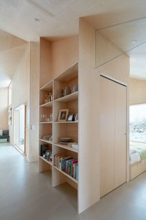 Transom glass above each door allows for light and views while reducing sound transmission.