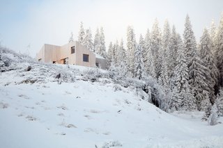 During the winter, the Youngs go on long ski tours and warm up in the sauna.