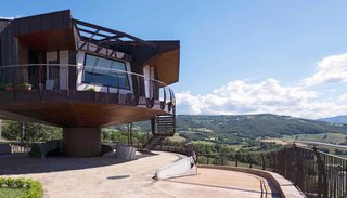 The home draws inspiration from the Villa Girasole, a rotating home built in the 1930s near Verona by architects Angelo Invernizzi and Ettore Fagiuli.