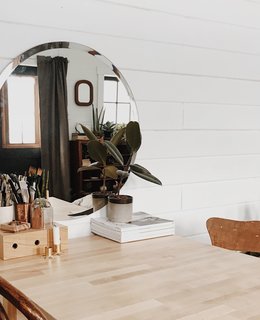 The fold-down table serves as a dining table and work surface.