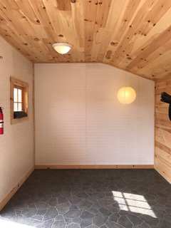 The interior of the prefab shed before renovations.