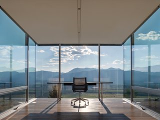 The thin pillars and glass walls in the cantilevered study are evocative of the clean lines found in Apple stores, many of which have also been designed by Bohlin Cywinski Jackson.
