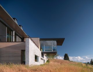 Exposed concrete walls provide thermal mass and protection from wildland fires.