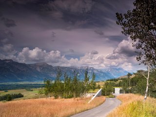 Set at an elevation of 6,700 feet, the home overlooks extraordinary views of the Snake River Valley and the Teton Mountain Range.
