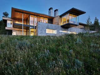 Since the home is located in a Class D Seismic Zone, the architects have designed the home beyond code-required structural standards with concrete foundations, steel columns, and composite decking.