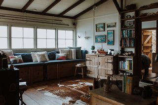 The couple built many furnishings, such as the storage chests, out of old leftover timber.