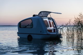 The rooftop, made of polyester and reinforced fiberglass, retracts to bring the sky indoors.