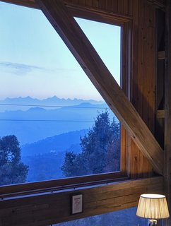 Views of the of the Northern Himalayan range in the distance.