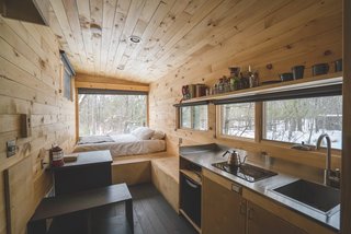 The cabins come stocked with snacks for purchase, including coffee, teas, pasta, s’mores, and popcorn.