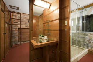 Due to its high cost, clear Western larch was an unusual option for interior paneling at the time of construction. However, it became a cost-effective choice thanks to the homeowner's lumber business connection.