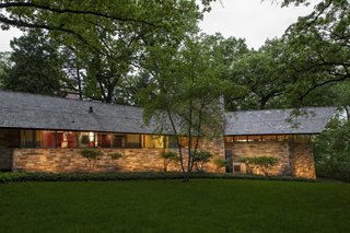 Rooted in Usonian design principles, the home's living room, dining area, kitchen, and maid's quarters are located in the "active" wing, while the three bedrooms and two bathrooms are housed in the second wing.