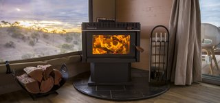 In addition to a spacious bath, Dulili also features a designer kitchen, a wood-burning fireplace, screened windows, and a fire pit.