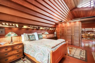Accordion doors separate the master bedroom from the great room.