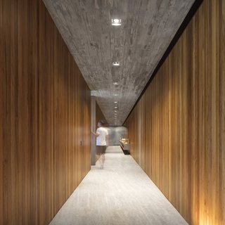 The north-south hallways divide the programmatic areas to the east and west.
