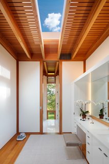A large skylight lets ample light into the bathroom.