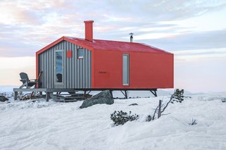 The north-end of the cabin features an outdoor deck.