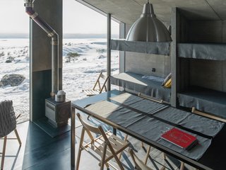 "A minimalistic colour spectrum was used in order not to distract from the main accent—the view from the window," adds the architects.
