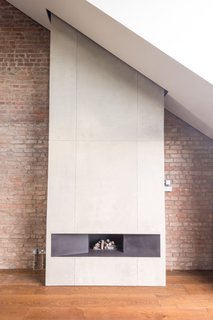 Exposed brick is used in the interior as a continuation of the building’s brickwork.