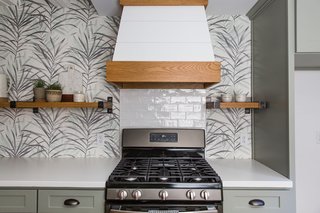  Grasscloth wallpaper from Wallquest has been added to the kitchen. This was one of the many ways Kate accomplished her design goal of bringing the "outside in."