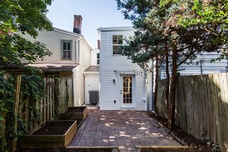 A look at the rear of the house as seen from the backyard.