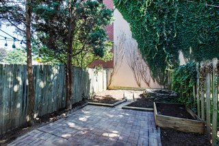 Ironically, minimal work was required in the backyard, which was simply cleaned up and power washed. The fish pond in the rear was also filled in.