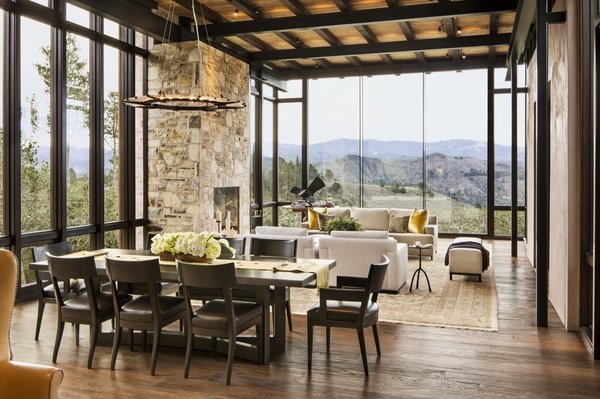 Full-height glazing ushers in incredible views of the hills to the south.