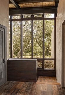 Natural light and outdoor views are invited in throughout the home.