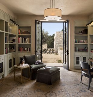 The library overlooks the courtyard and the two guest bedrooms.