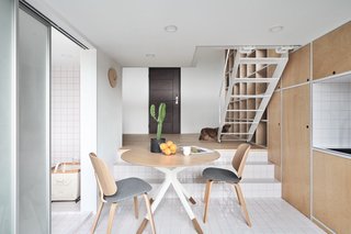 The living area and eat-in kitchen are separated by a level change.