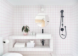 The colored tile grout was sourced from Grout360. The tiles are from RAK Ceramics.