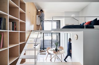 The bedroom is located on the mezzanine level.