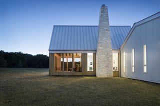 The screen porch extends out from the living room into the heart of the home.