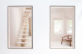 Each of the windows are deeply recessed, creating a frame-like effect.