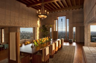 Ample glazing sweeps the cinematic landscape into the dining room, the largest space in the house.
