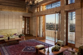 The living room opens up to a spacious, south-facing terrace.