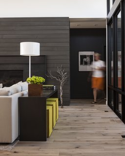 Reclaimed white-oak engineered flooring is used throughout the home.