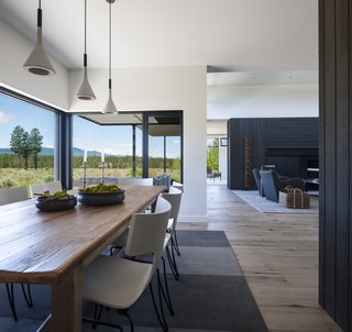 When the sliding panels in the master bedroom are recessed, the opening allows natural light and views to flow unobstructed through the home.
