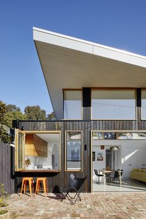 Sweeping eaves protect the home from unwanted solar gain.