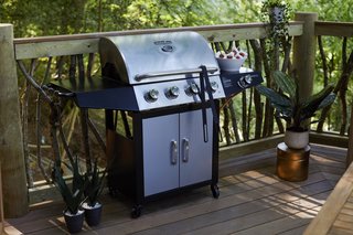 The hexagonal deck also features a classic five-burner gas grill to satisfy the guests' cookout needs.