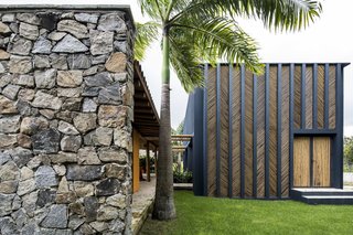 "The bamboo panels shade the facade, helping the thermal behavior of the building," add the architects.