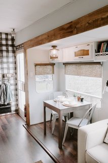 The floors were replaced with laminate wood flooring from Home Depot.