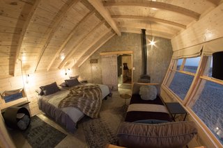 A fish-eye view of the guest cabin looking toward the bathroom. The floors are built of OSB board on South African pine substructure on treated gum-pole supports with Brits Isotherm insulation.