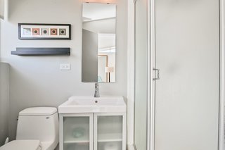 A peek inside the master bathroom. The house comes with two full baths.