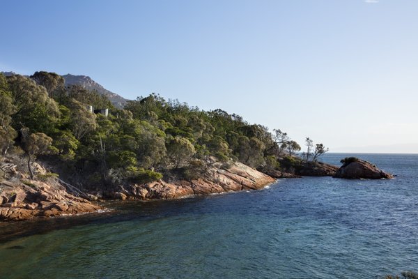Freycinet Lodge's Coastal Pavilions overlook Great Oyster Bay and the dramatic granite Hazard Mountains.