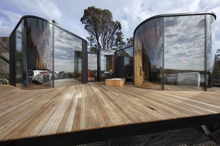 Meticulous detailing was required to create the curved forms. The deck is built of Grey Gumand and the roof is topped with Colorbond Trimdeck Sheeting in Night Sky Finish.