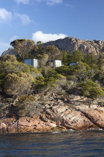 The nine pavilions are perched atop the beautiful, weathered pink granite of the Freycinet Peninsula.