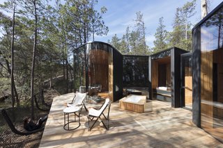 The netted, hammock-like balustrades are an innovative solution that provides safety and a place for relaxation, while keeping views as unobstructed as possible.