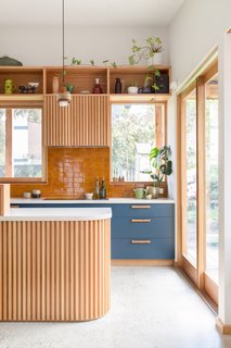 Shielded by overhanging eaves, ample northern glazing lets in an abundance of natural light and views of the outdoors.