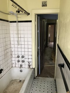 This bathroom, later converted into an office, was in a severe state of disrepair.